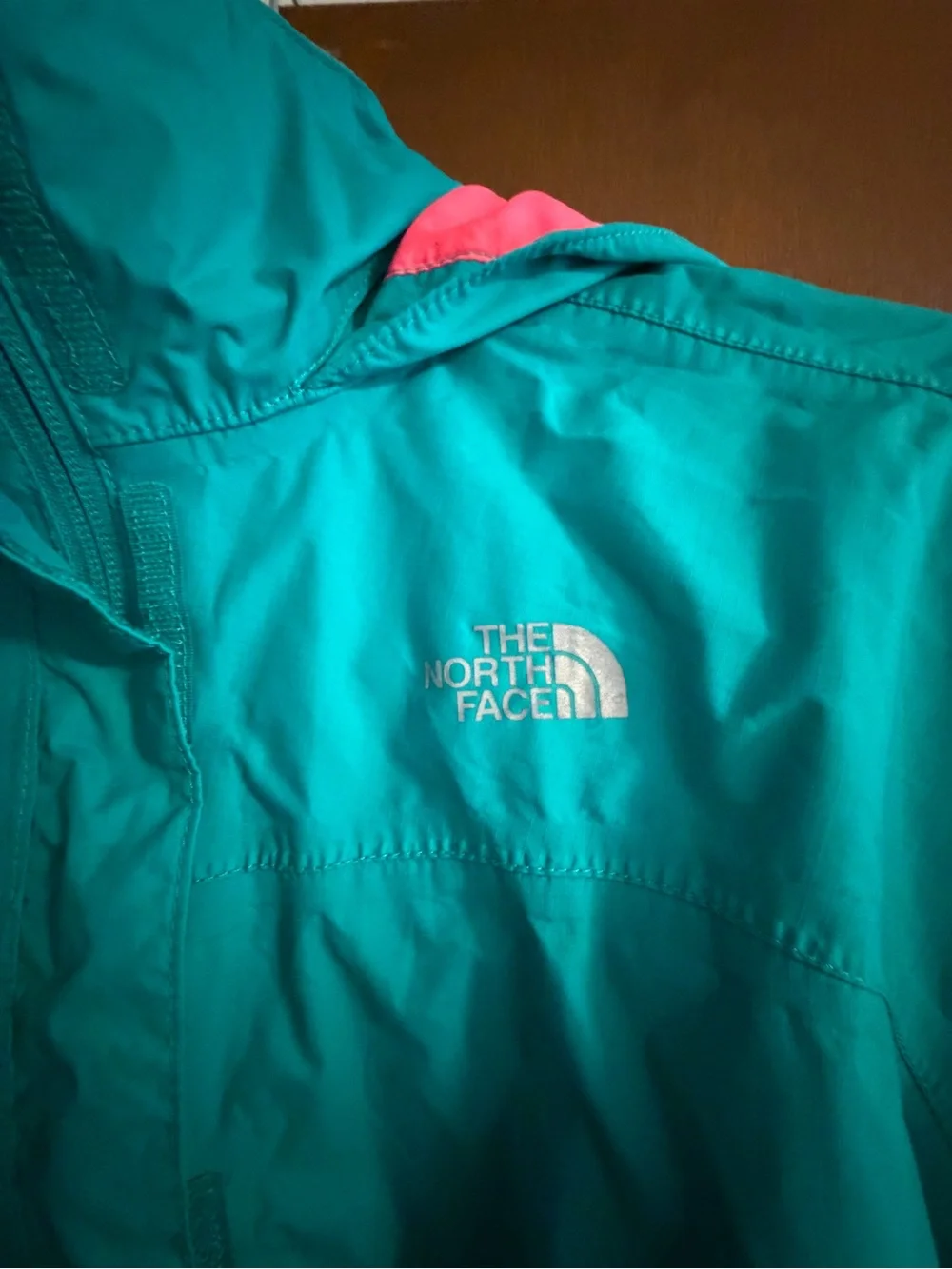 The North Face Turquoise Rain Shell with Pink Trim
